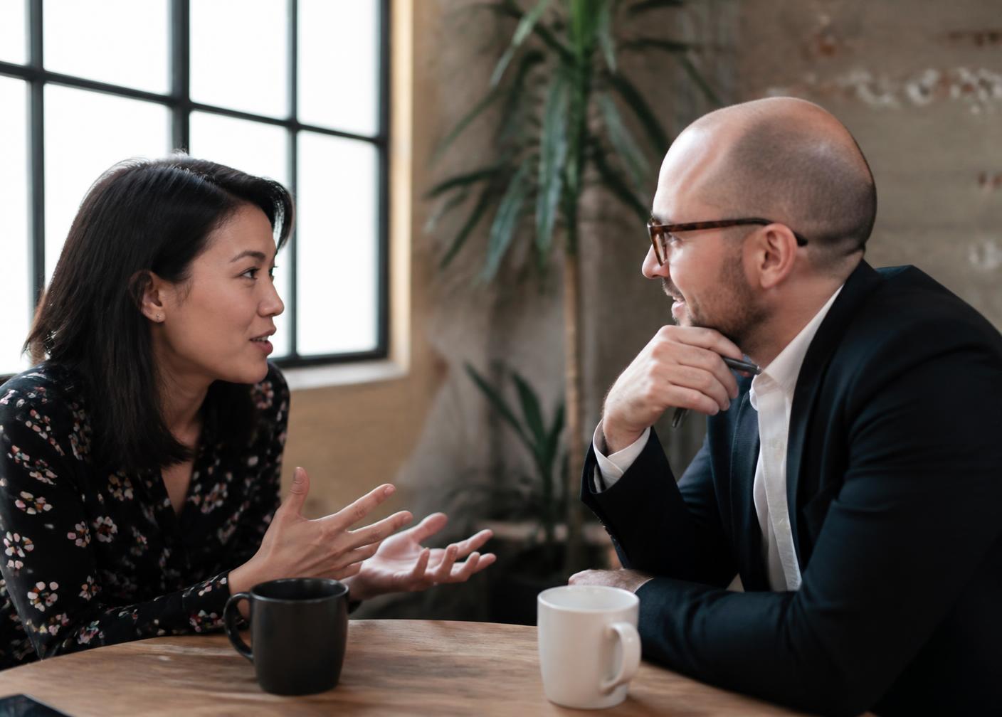 Two professionals deep in conversation